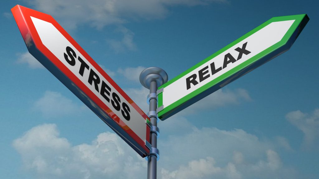 Signpost with arrows: "Stress" in red, "Relax" in green.