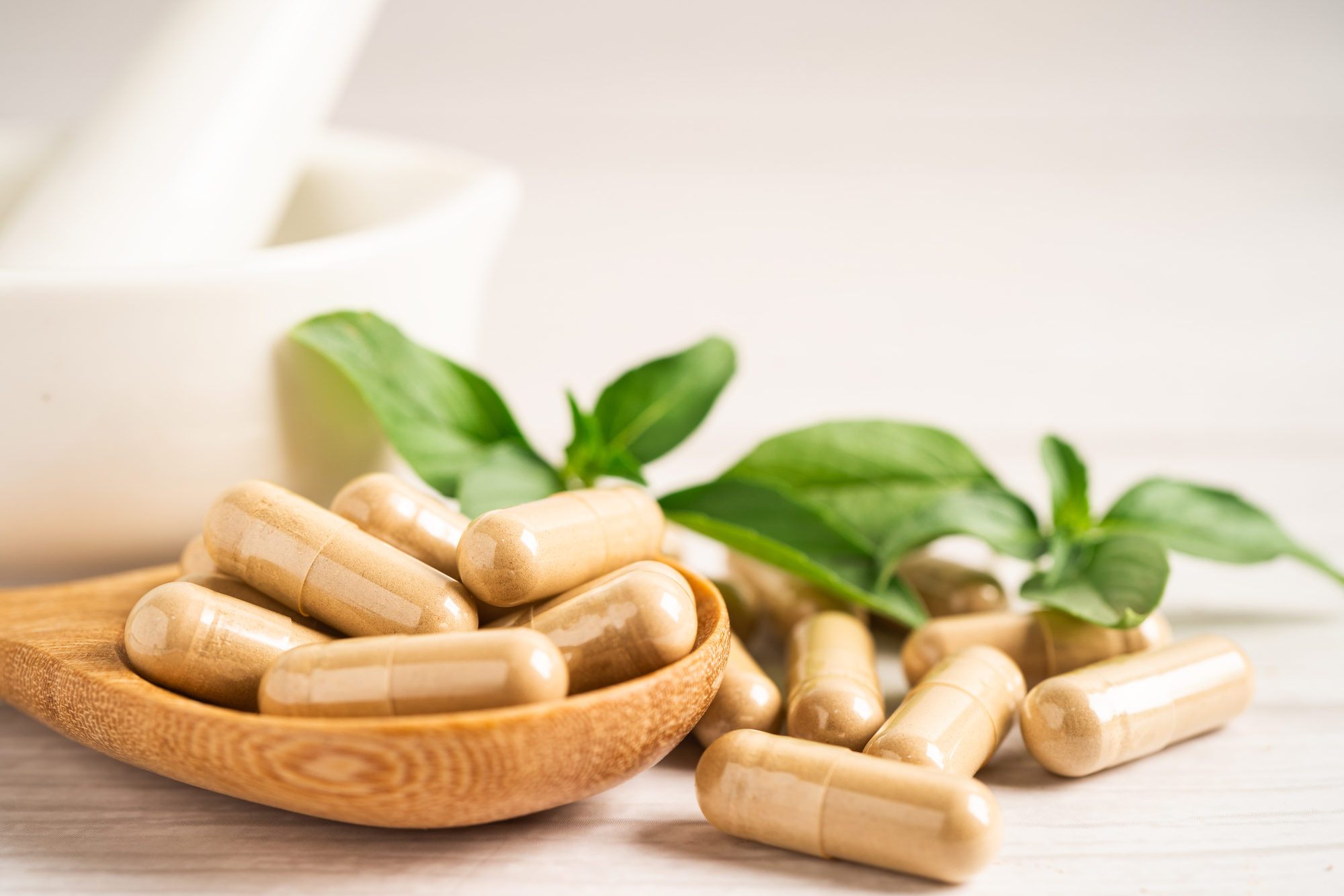 Supplementing with ashwagandha capsules.