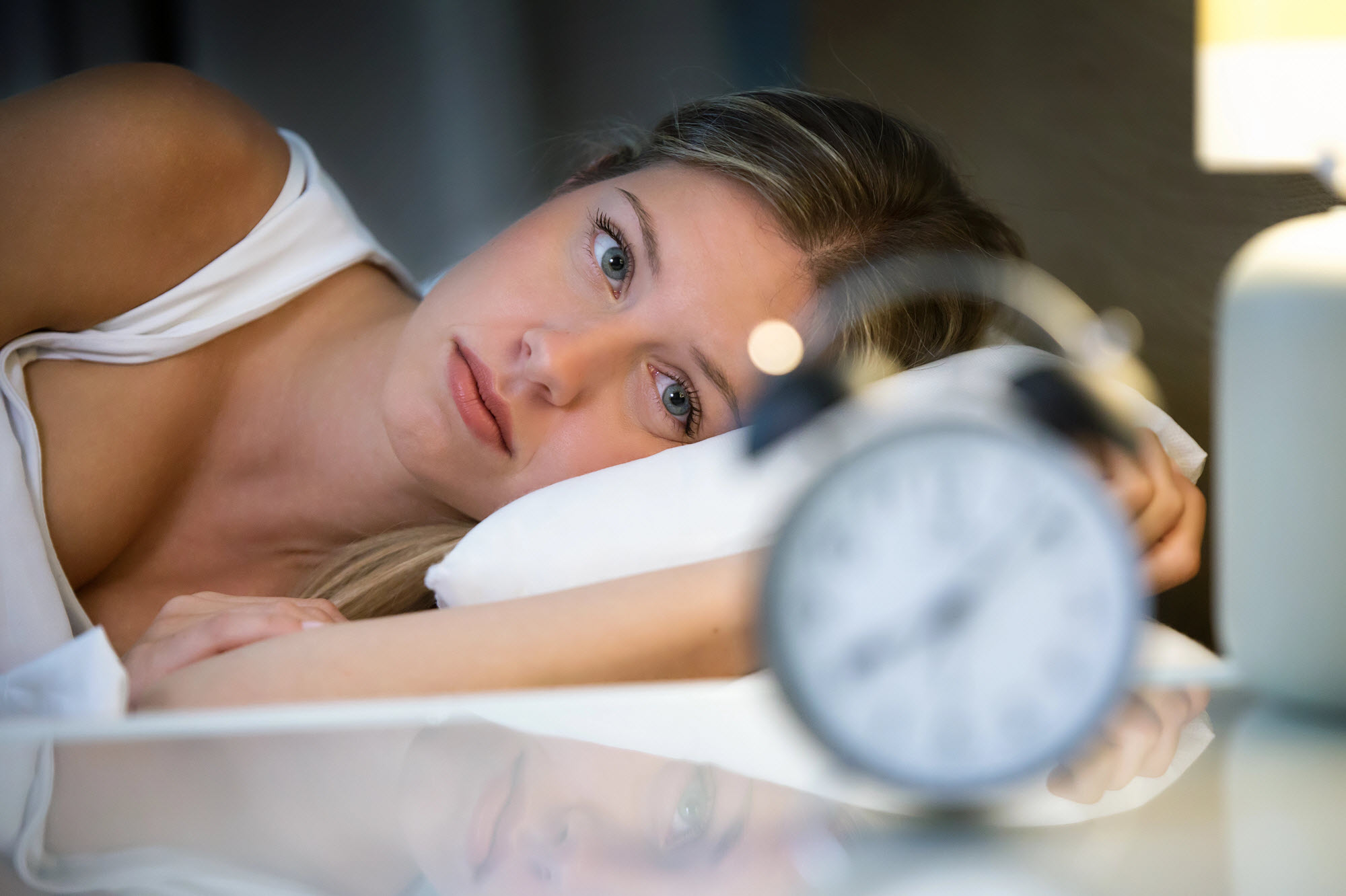 woman experiencing insomnia in midlife