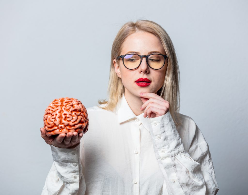 Woman showing the gut brain connection